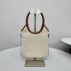 Borsa a mano Ivy  in canvas e pelle MIUMIU