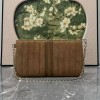 Pouch GG Marmont con cinturino GUCCI