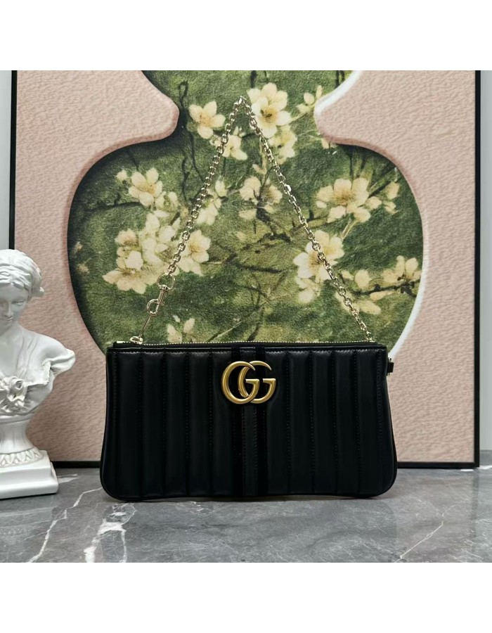 Pouch GG Marmont con cinturino GUCCI