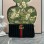 Pouch GG Marmont con cinturino GUCCI