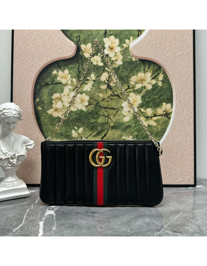 Pouch GG Marmont con cinturino GUCCI
