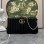 Pouch GG Marmont con cinturino GUCCI