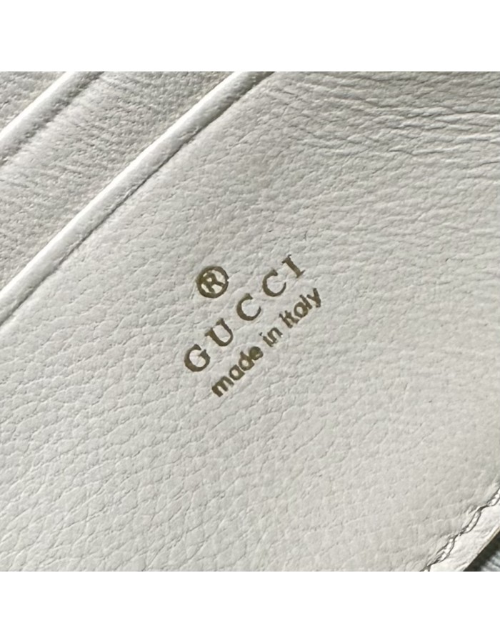 Pouch GG Marmont con cinturino GUCCI
