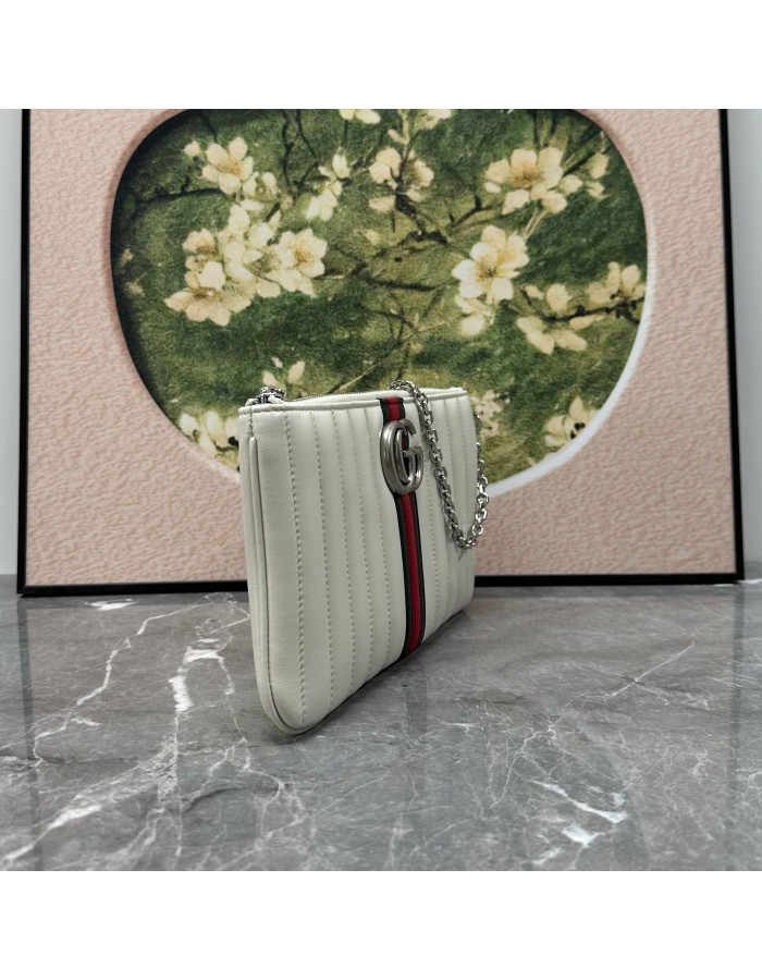 Pouch GG Marmont con cinturino GUCCI