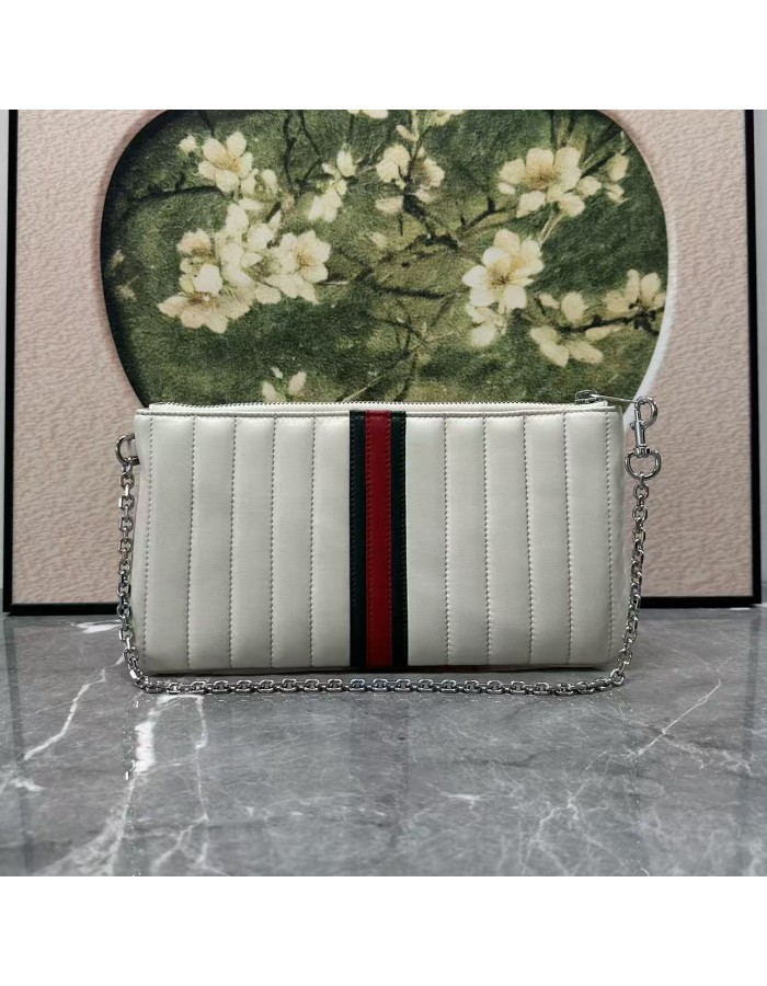 Pouch GG Marmont con cinturino GUCCI