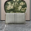 Pouch GG Marmont con cinturino GUCCI
