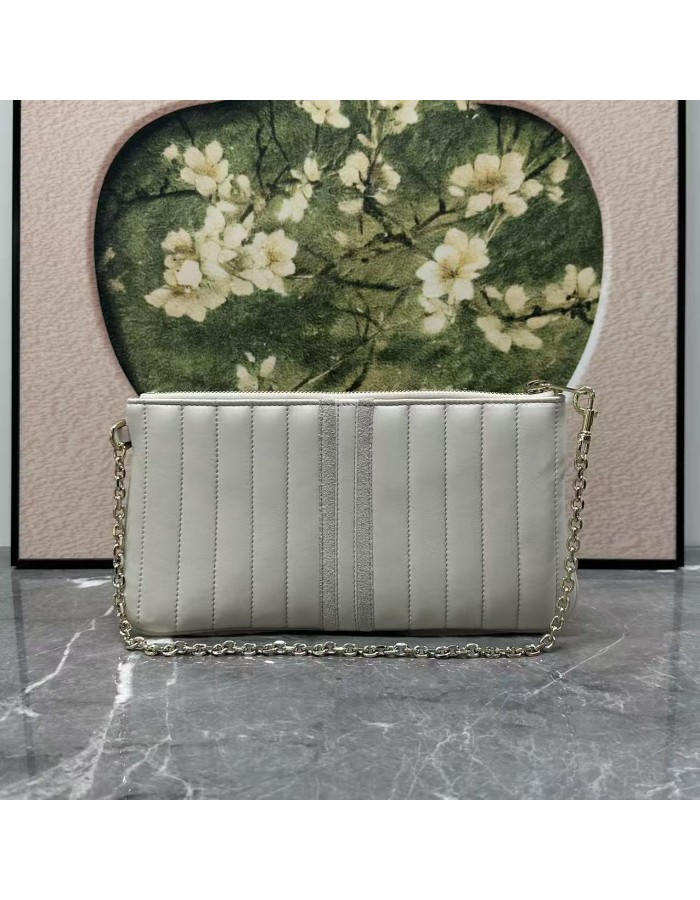 Pouch GG Marmont con cinturino GUCCI