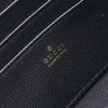 Pouch GG Marmont con cinturino GUCCI