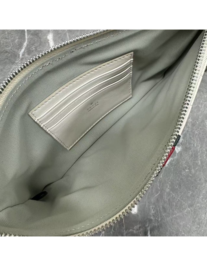 Pouch GG Marmont con cinturino GUCCI