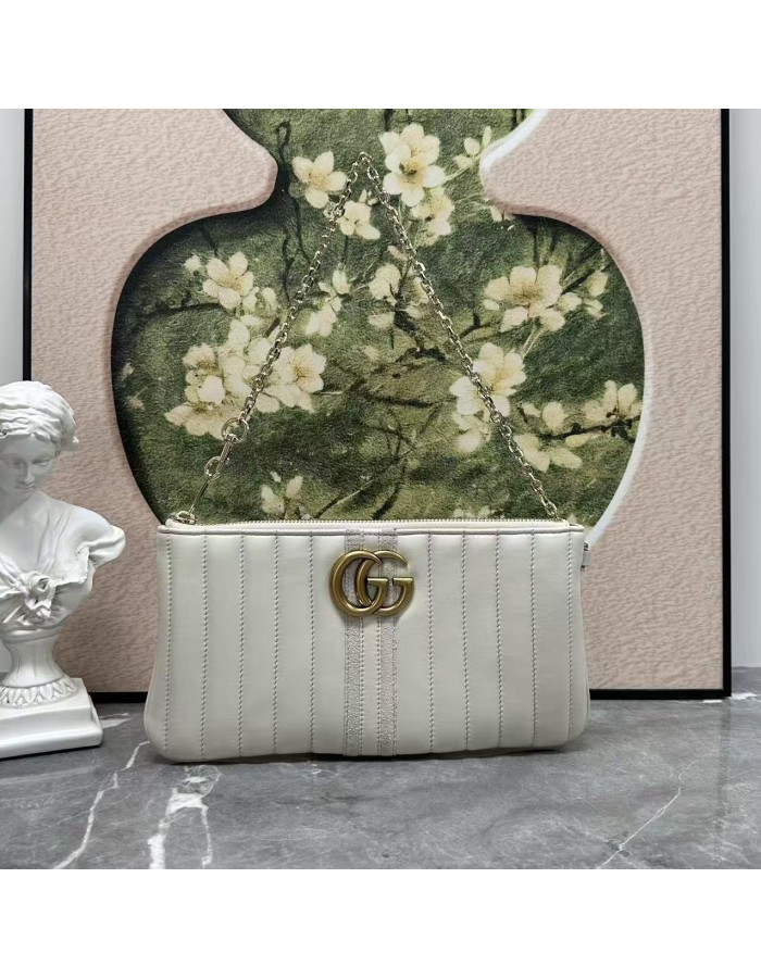 Pouch GG Marmont con cinturino GUCCI