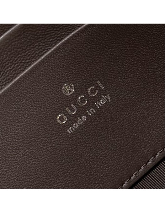 Pouch GG Marmont con cinturino GUCCI
