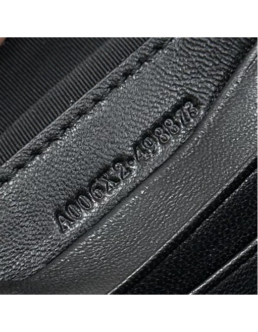 Pouch GG Marmont con cinturino GUCCI