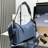Borsa Prada Explore large in Re-Nylon e pelle PRADA