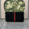 Pouch GG Marmont con cinturino GUCCI