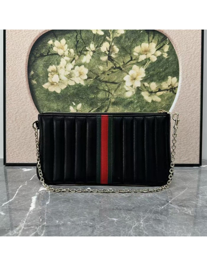 Pouch GG Marmont con cinturino GUCCI