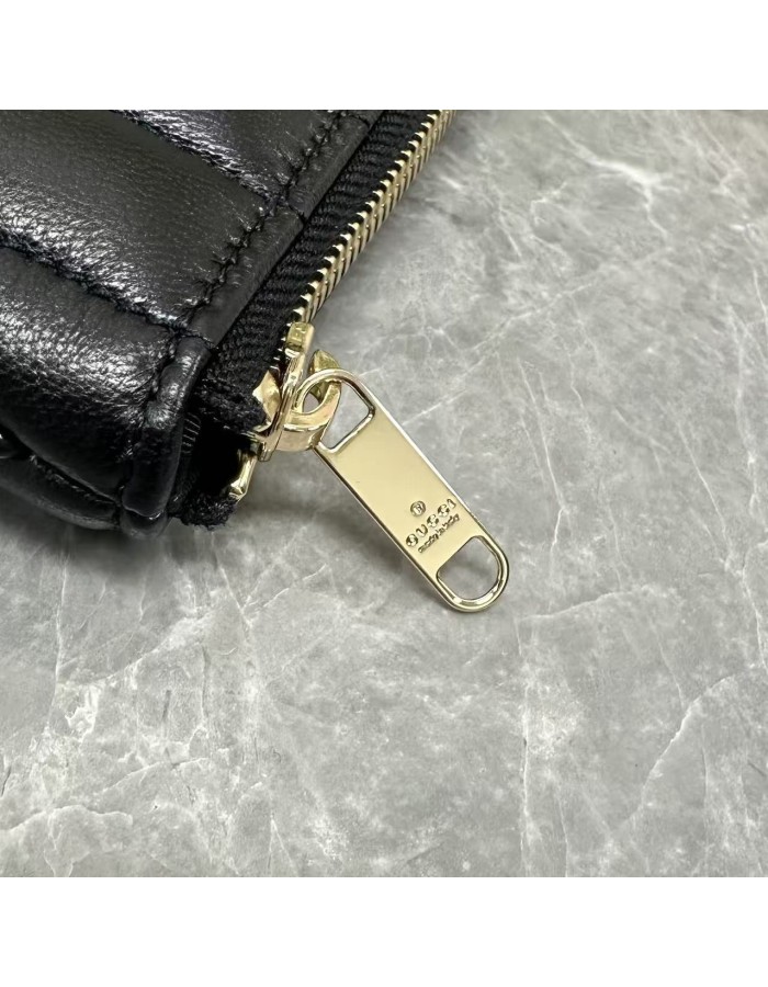 Pouch GG Marmont con cinturino GUCCI