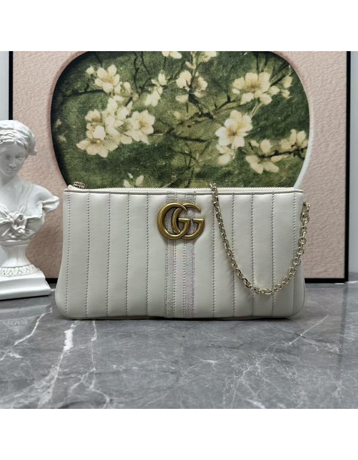 Pouch GG Marmont con cinturino GUCCI