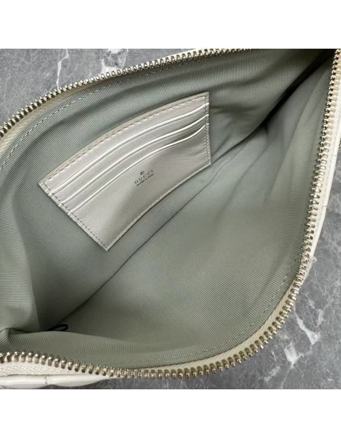 Pouch GG Marmont con cinturino GUCCI