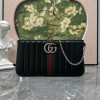 Pouch GG Marmont con cinturino GUCCI