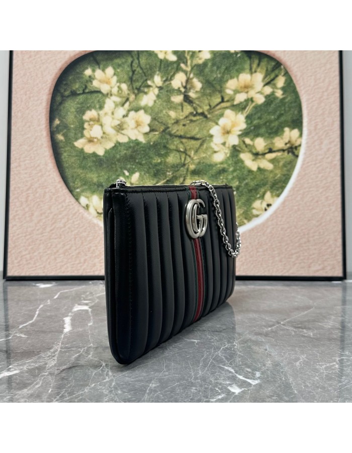 Pouch GG Marmont con cinturino GUCCI