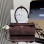 Borsa a mano Prada Bonnie medium in pelle scamosciata PRADA