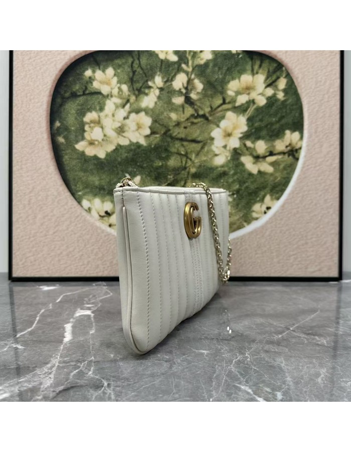 Pouch GG Marmont con cinturino GUCCI