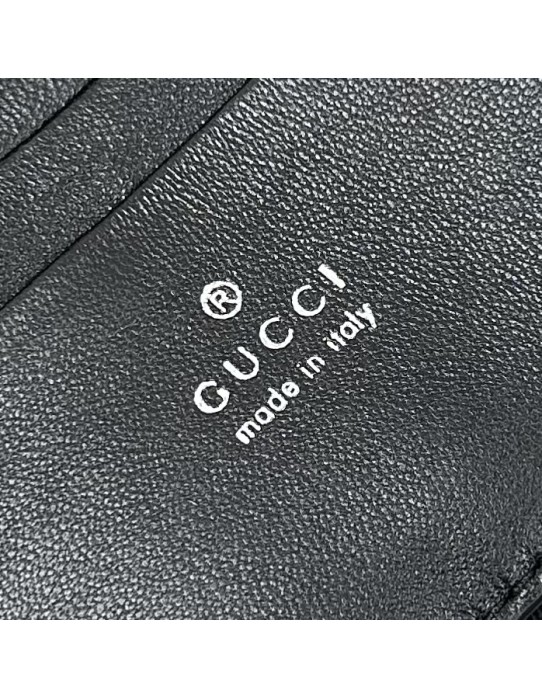 Pouch GG Marmont con cinturino GUCCI