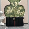 Pouch GG Marmont con cinturino GUCCI