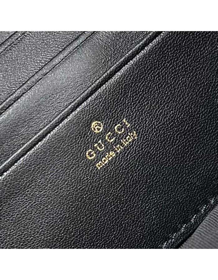 Pouch GG Marmont con cinturino GUCCI