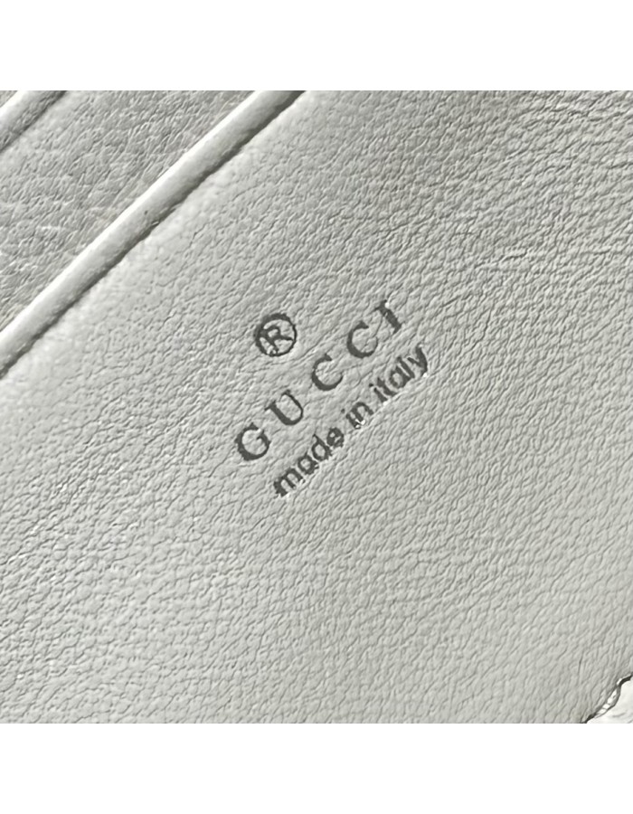 Pouch GG Marmont con cinturino GUCCI
