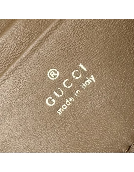 Pouch GG Marmont con cinturino GUCCI